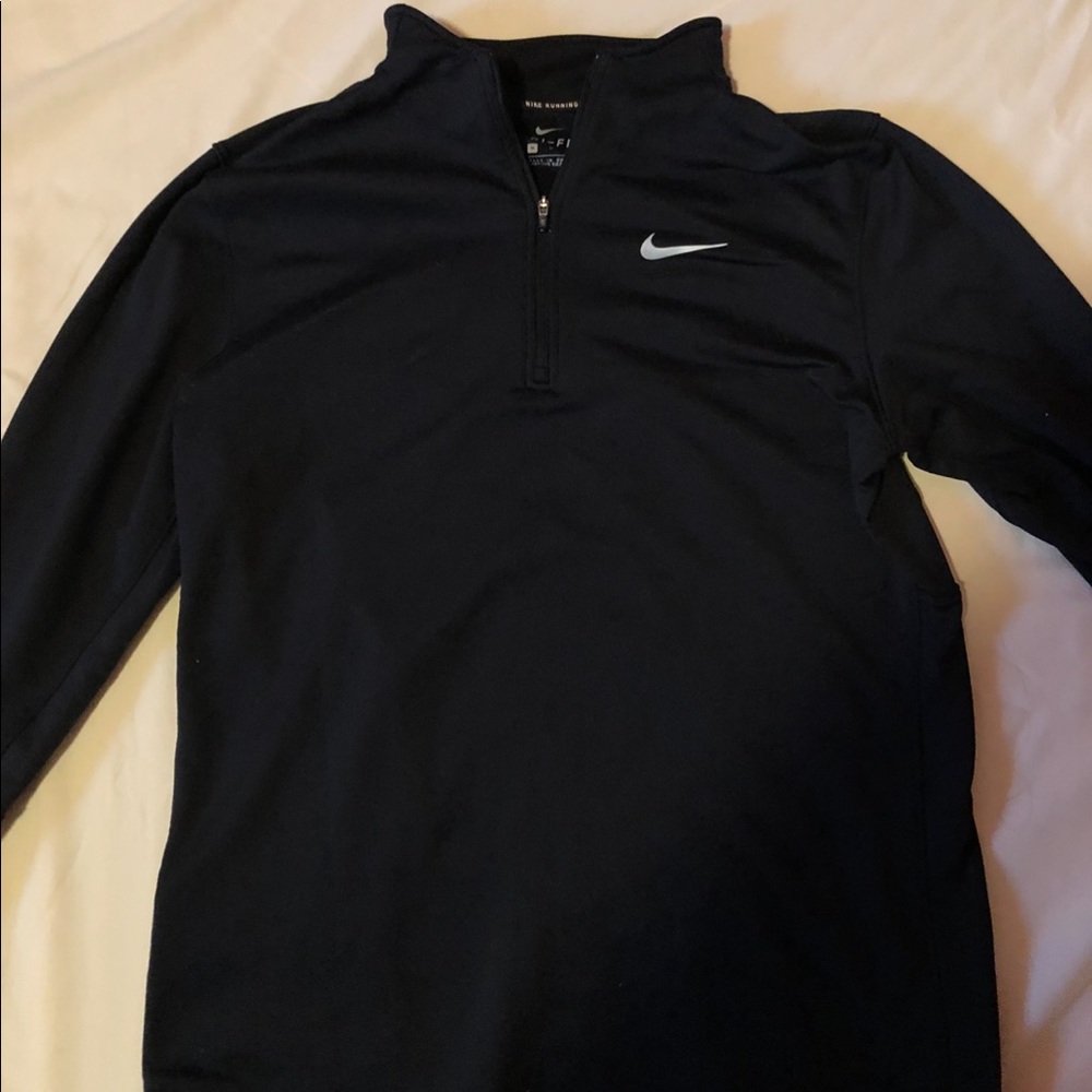 Nike running dry fit size Medium. Really good for jogging in the winter or fall